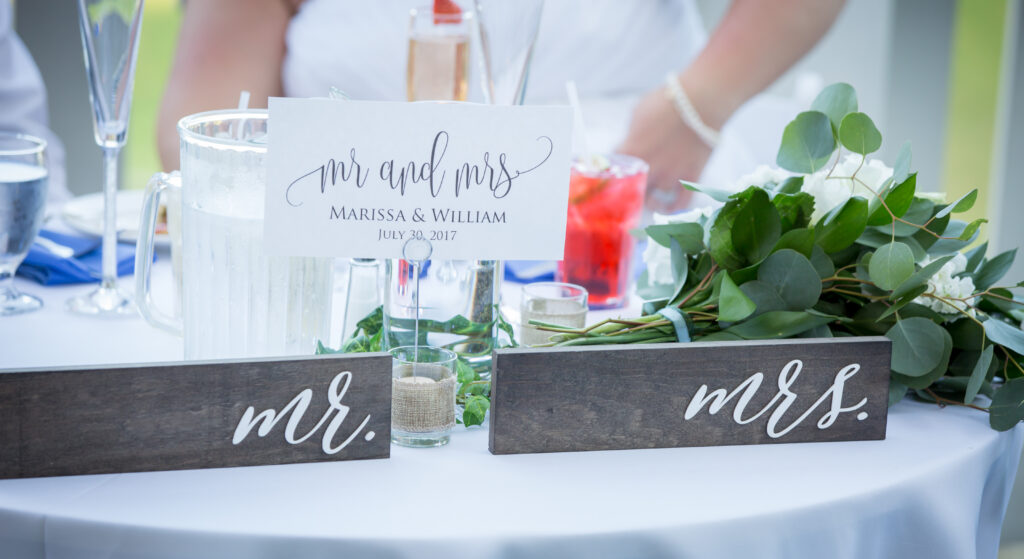 Mr & Mrs sign on head table